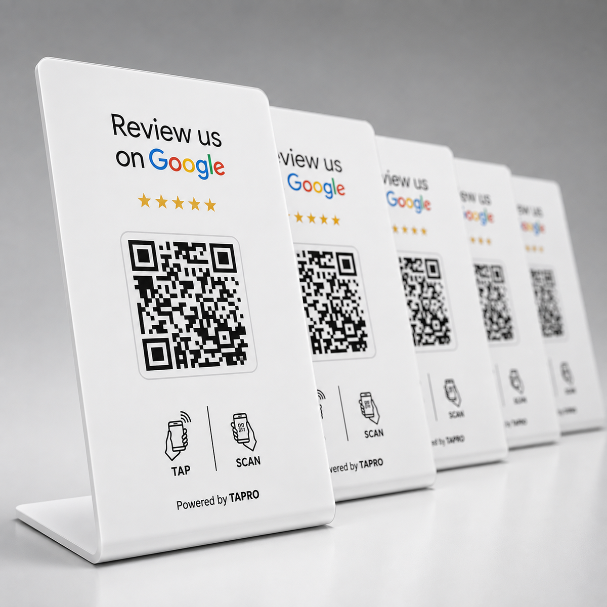 White NFC Google review stands with QR codes for business customer review collection