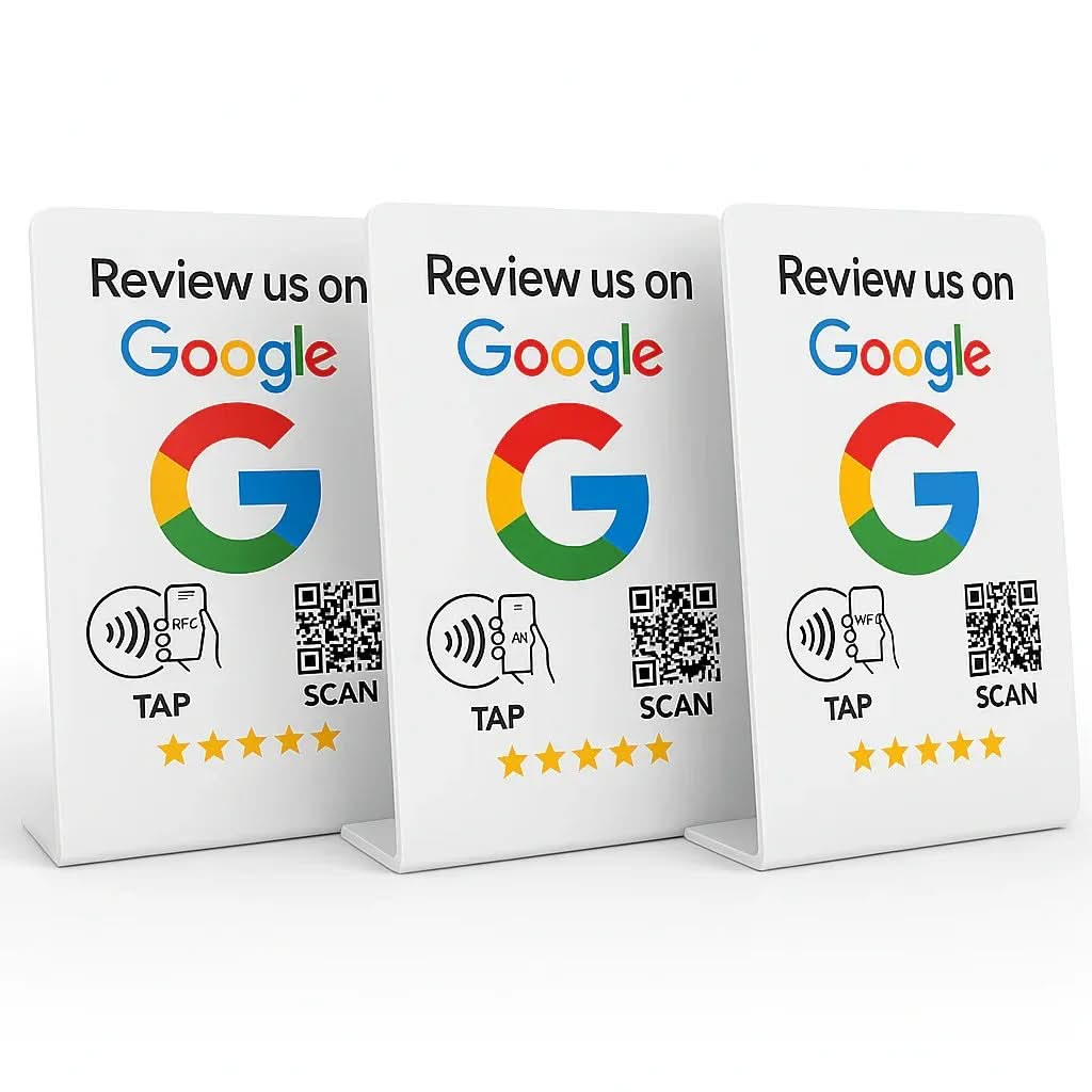 Three white Google review stands with QR codes, tap icons, and five-star ratings